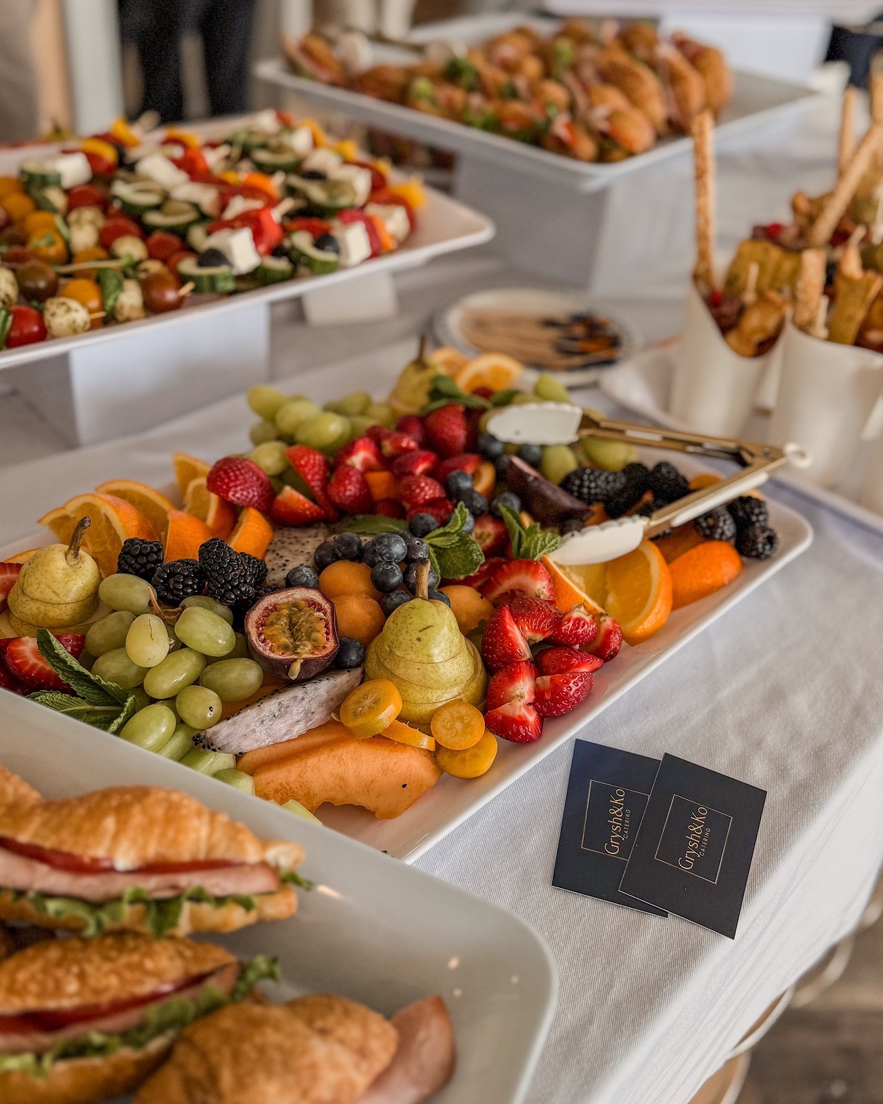 Fresh fruit, sandwiches and buffet dishes